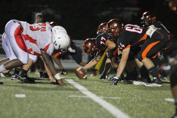 Edwardsville prepares to hike the ball.