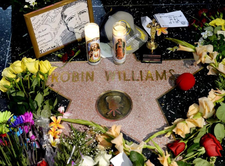 A memorial for Robin Williams at his star on the walk of fame.