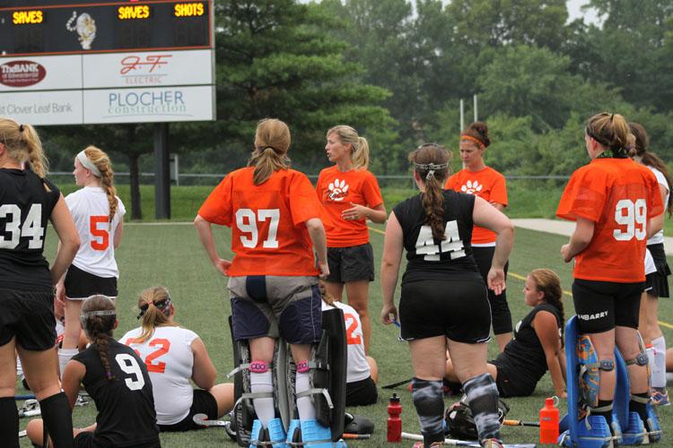 Photo By Devin Kane
Head Varsity Coach Julia Tyler talks with her team during the Orange and Black Scrimmage