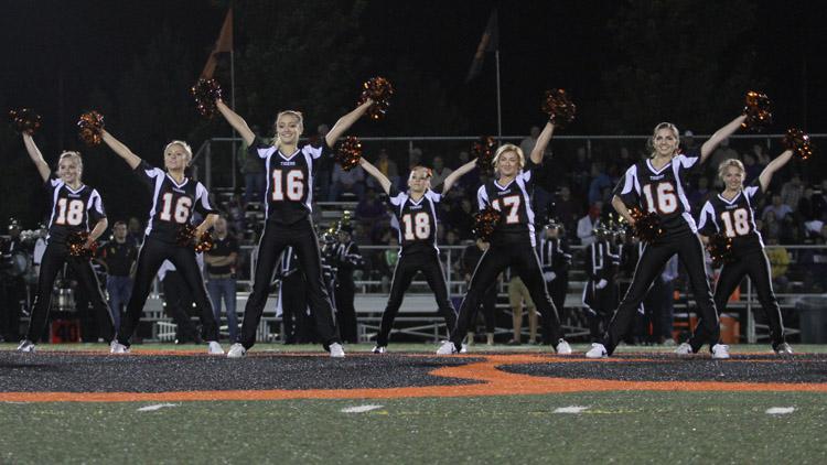 The Tiger dance team takes the field in the halftime performance during a football game against Collinsville this season. 
