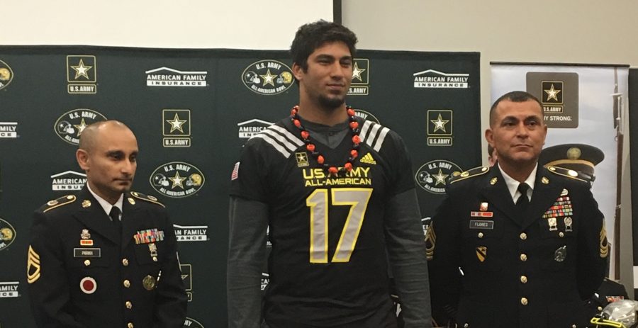 Epenesa+accepts+Army+All-American+Bowl+jersey+at+ceremony.