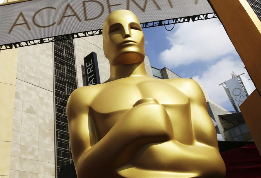 The Academy's decision to postpone the Oscars' newest category comes after widespread debate over the merits of "popular" films.