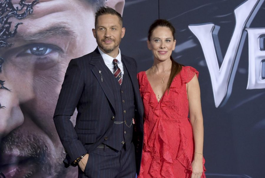 Lead actor Tom Hardy, left, and writer Kelly Marcel at the world premiere of Venom in Los Angeles. 