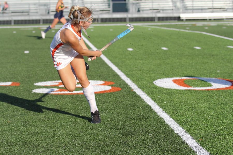 Sophomore Rachel Goebel passes the ball down the turf.