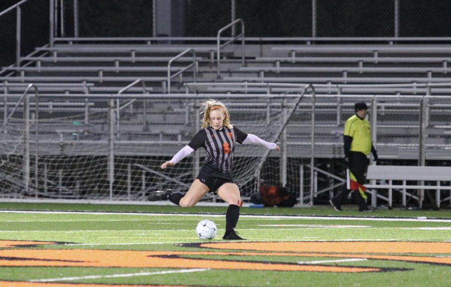 Senior Sarah Kraus sends the ball down the field.