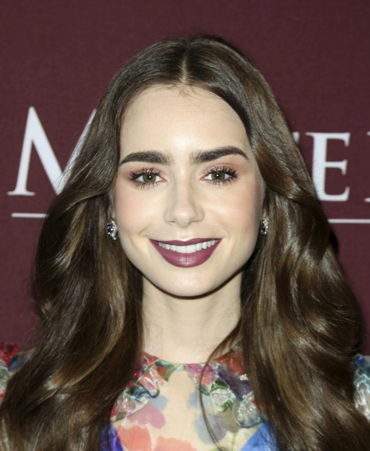 Actor Lily Collins attends the premiere of 'Les Miserables' last year in Los Angeles. Collins portrays the title character in 'Emily in Paris.'