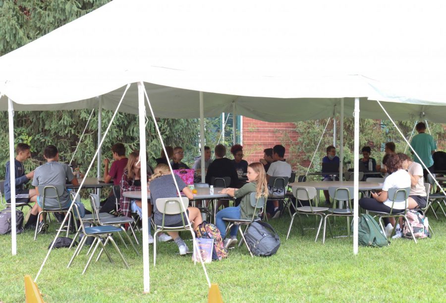 Students eat lunch outside in the district's attempt to minimize COVID-19 spread.