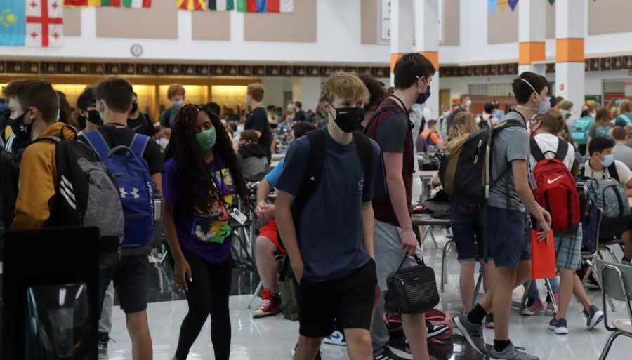 Students wait in cafeteria prior to the beginning of the school day on August 12. 