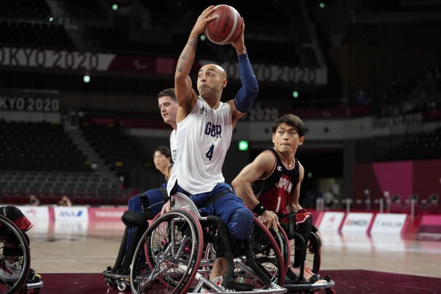 Paralympic basketball players fight for ball in the 2020 Paralympic games. 