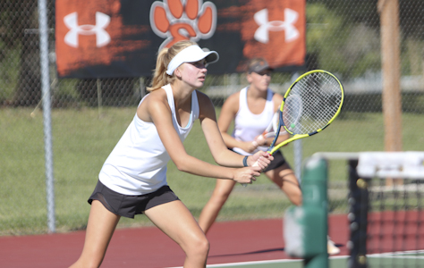 Sophomore Alyssa Wise waits for the ball in a home doubles match.  