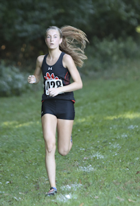 Sophomore Maya Lueking runs cross country's Sept. 18 meet at the SIUE course.  This was the only home meet of the season.