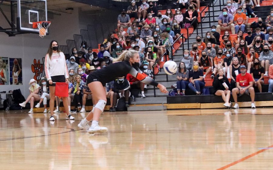 Junior Vyla Hupp plays in the Sept. 28 varsity volleyball game against O'Fallon