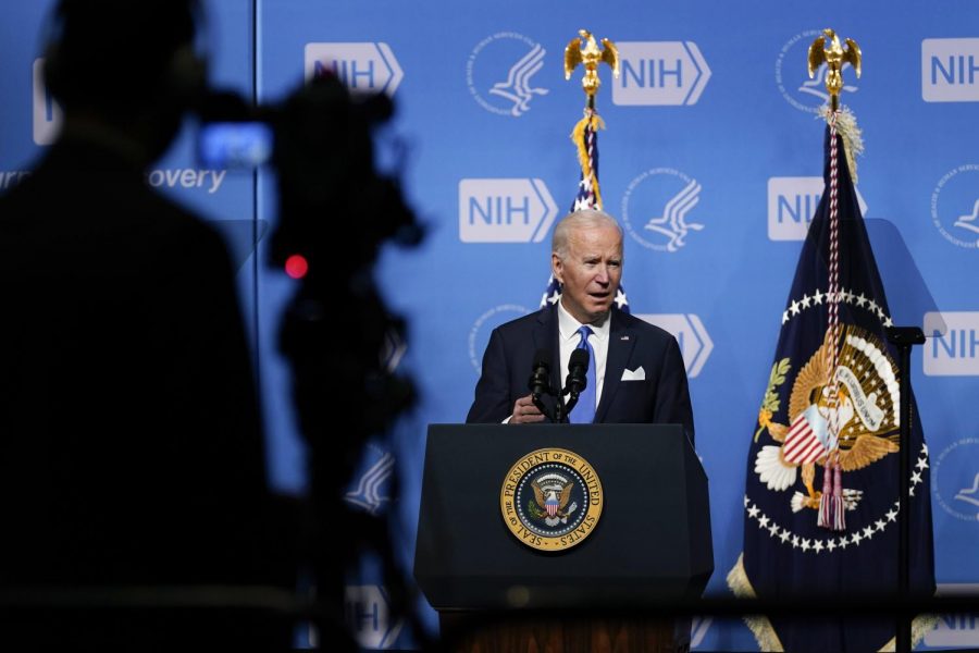 President Joe Biden speaks about the COVID-19 variant named omicron during a visit to the National Institutes of Health, Thursday, Dec. 2, 2021, in Bethesda, Md. Biden looked out over an audience of government scientists and framed his latest plan for fighting COVID-19 as an opportunity to at last put an end to divisiveness over the virus, calling the politicization of the issue a “sad, sad commentary.”