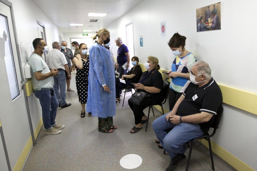 People wait to be vaccinated in Tbilisi, Georgia. The U.S. donated 500,000 Pfizer vaccines to Georgia. 