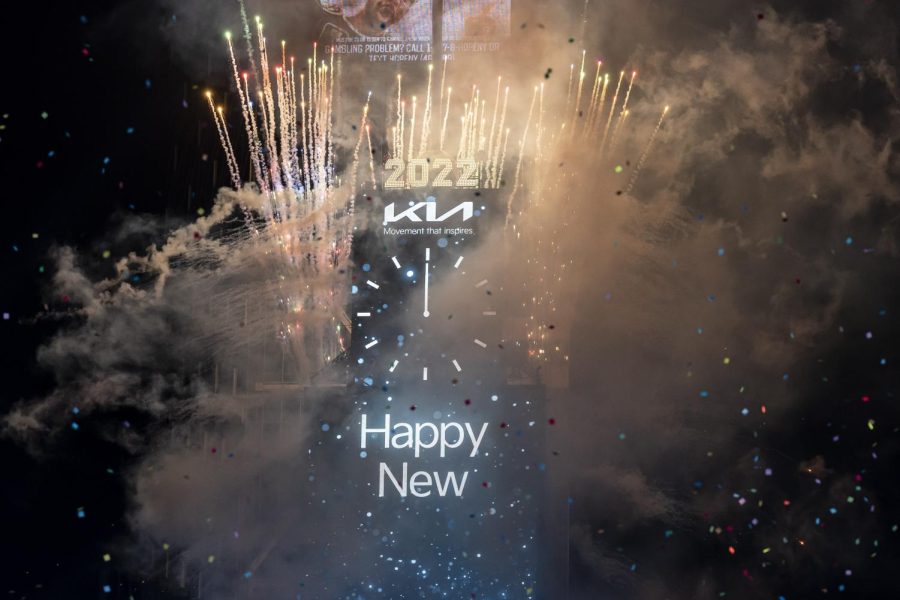 Fireworks and confetti mark the start of 2022 over New York Citys Times Square celebration.
