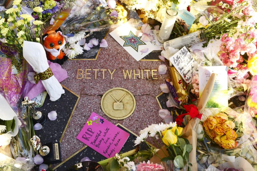 Fans build memorial for Betty White at her star on the Hollywood Walk of Fame