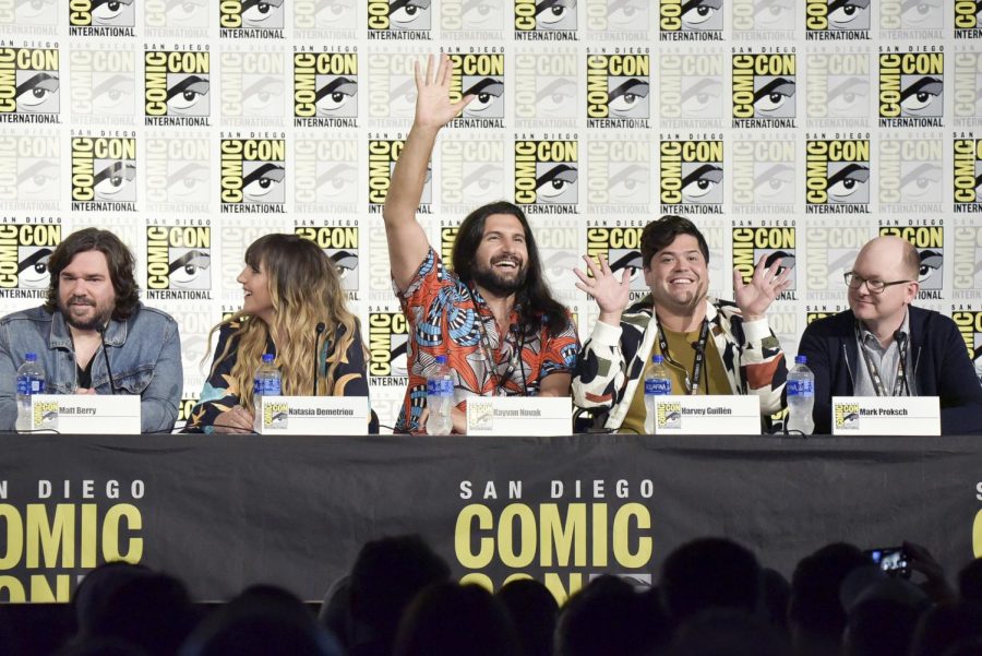 The cast of What We Do in the Shadows participates in a ComicCon panel.