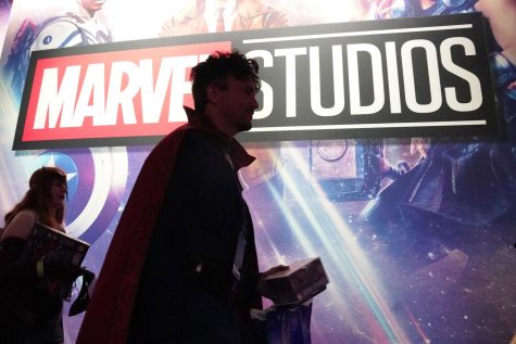 A Doctor Strange cosplayer walks past the Marvel Studios portion of the D23 Expo on Sept. 10, 2022.