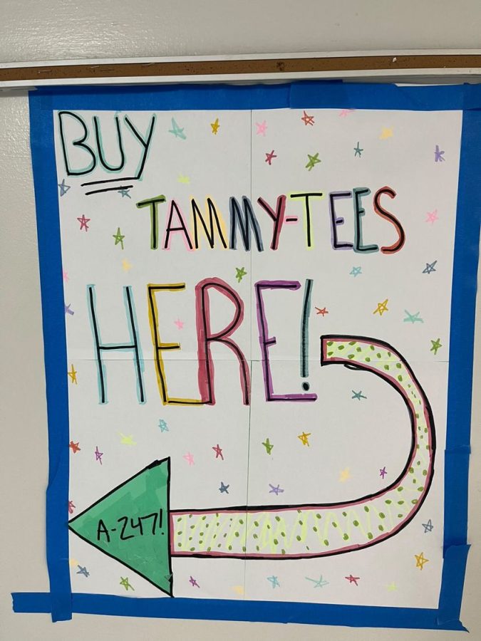 An advertisement for "Tammy Teez" sits outside of Mrs. Knabe's classroom.