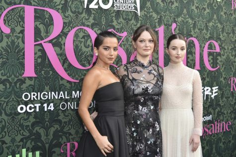 Actors Isabela Merced, Kaitlyn Dever and director Karen Maine pose together on the red carpet for the world premiere of Rosaline on Oct. 6.