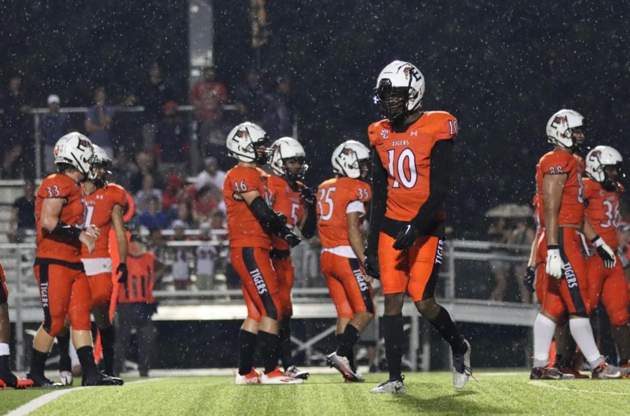 Senior Johnnie Robinson walks back to his cornerback position in a 31-28 victory against Highland 