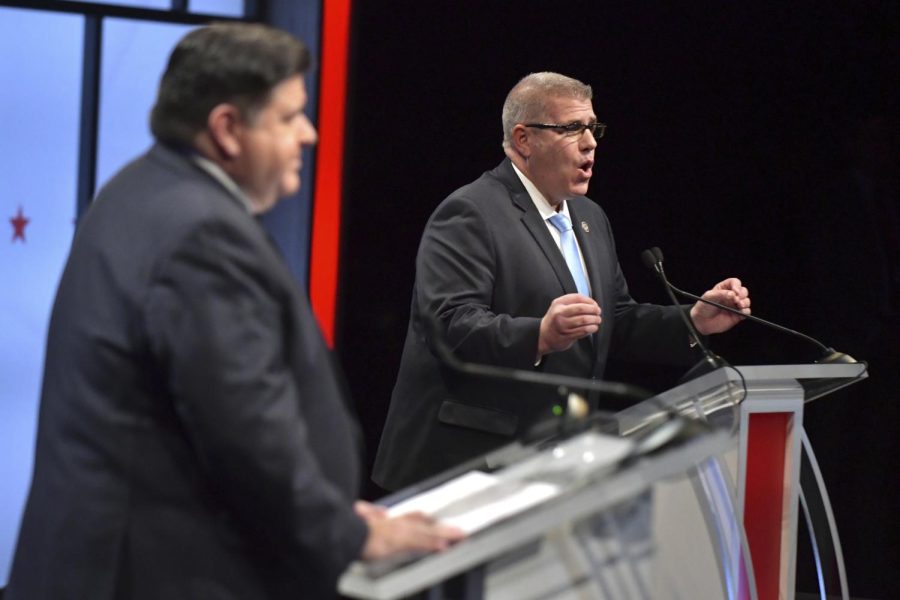 Incumbent Governor J.B. Pritzker and challenger Darren Bailey debate at the campus of Illinois State University during the 2022 election.