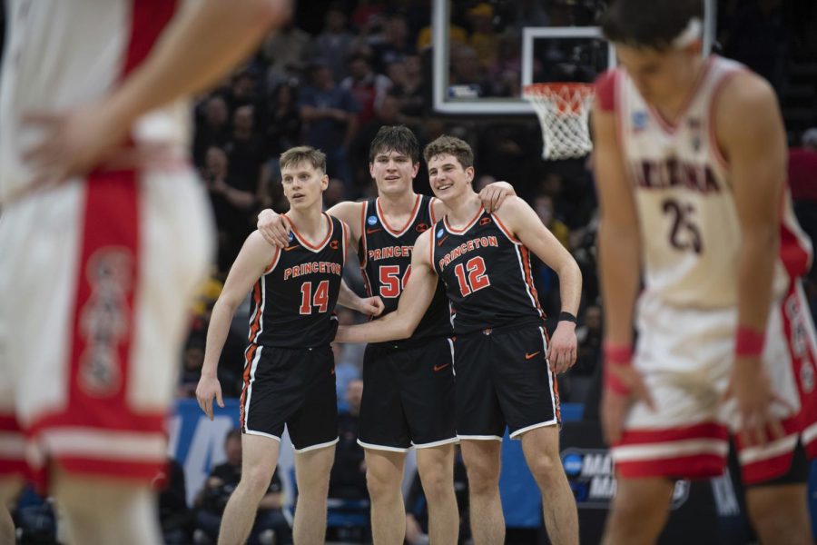 No. 15 Princeton celebrates after defeating No. 2 Arizona 59-55 in Sacramento, Calif, on March 16.