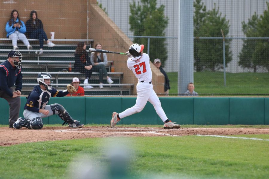 Sophomore Joseph Chiarodo hits the ball during a April 6 game against O'Fallon at the District 7 Sports Complex.