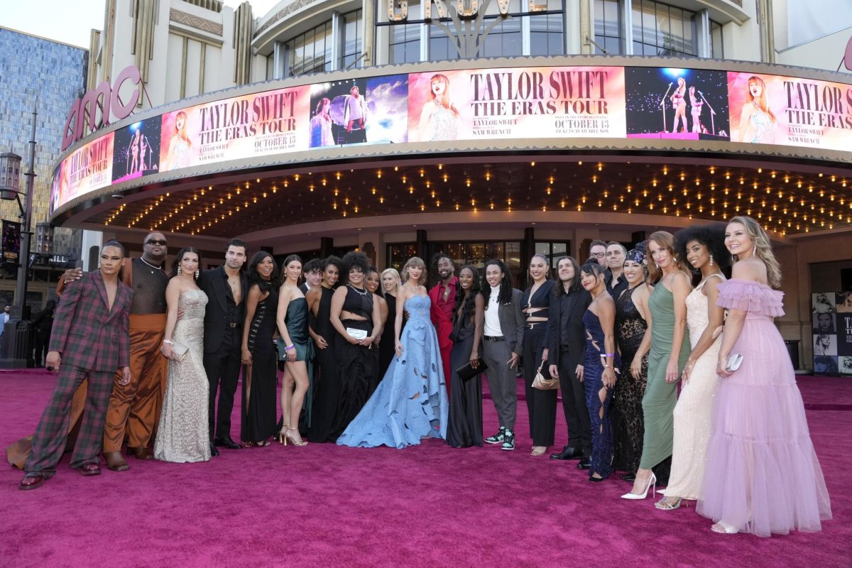 Taylor Swift and her backup dancers arrive at the world premiere of Taylor Swift: The Eras Tour on Oct. 11 in Los Angeles.