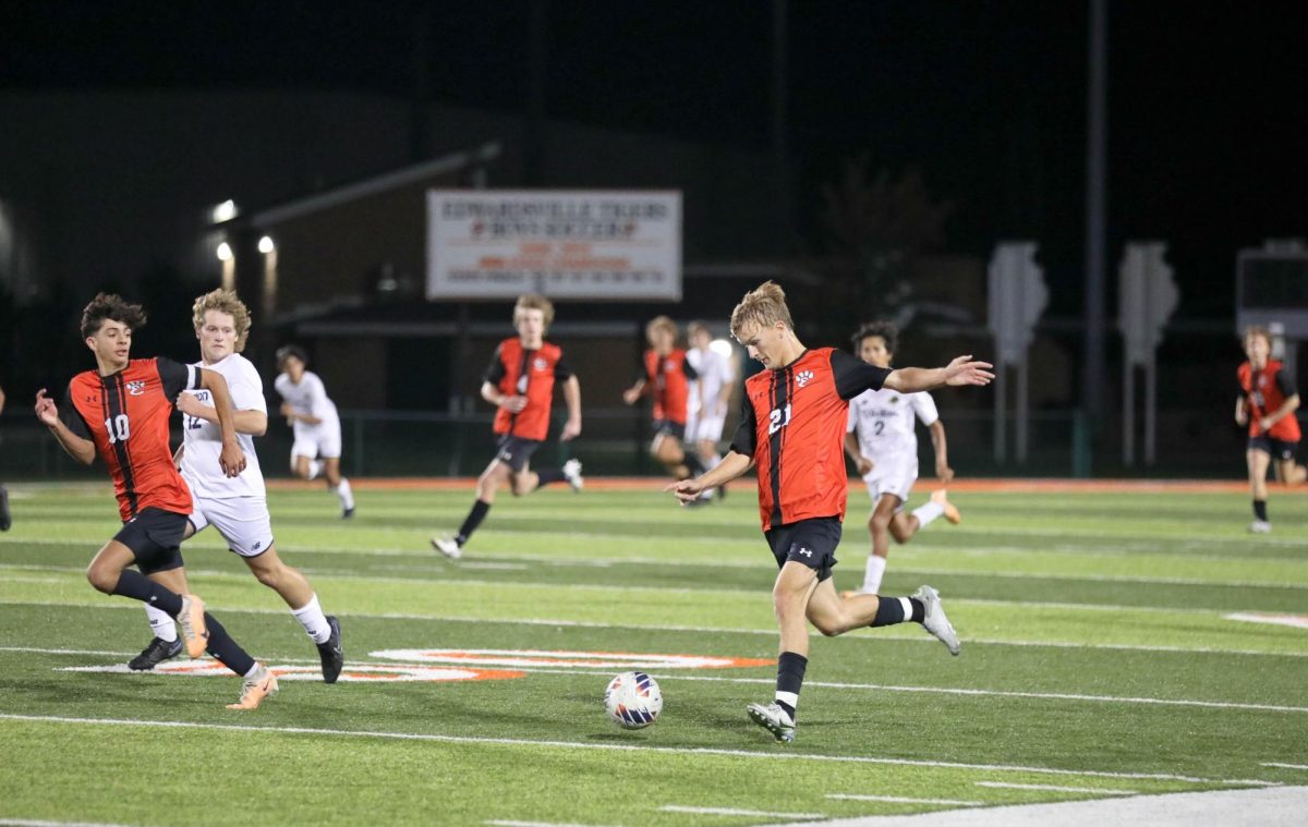 Senior Evan Moore prepares to send the ball at the Sept. 7 game against Gibault Catholic.