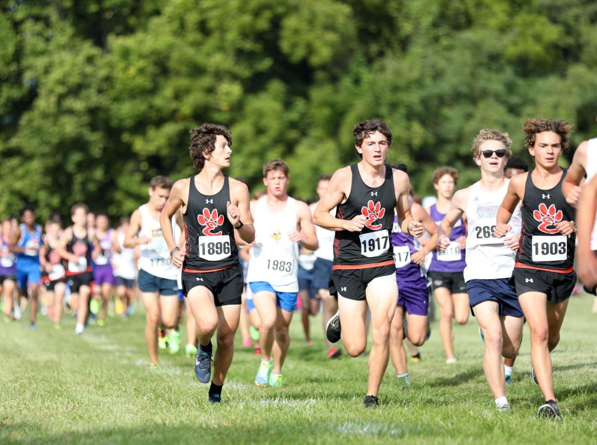 The boys cross country team runs during a meet on Sept. 16.