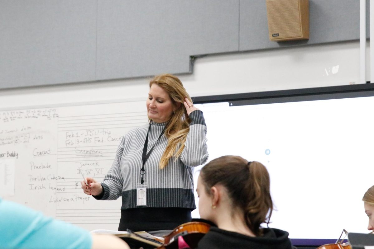 Ms. Voumard teaching her fifth hour orchestra class.