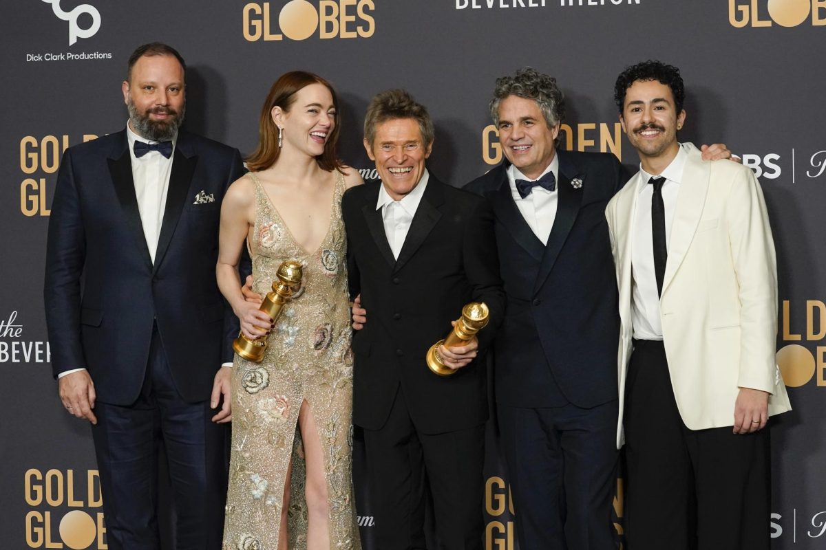 "Poor Things" cast celebrating their two wins at the 81st Golden Globes.
