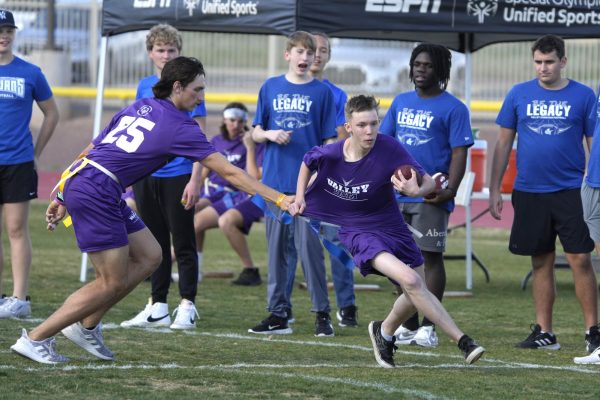 Students from Willow Canyon and Shadow Ridge High School play an exhibition flag football game on the same team on Monday, Feb. 6, 2023 in Surprise, Ariz.