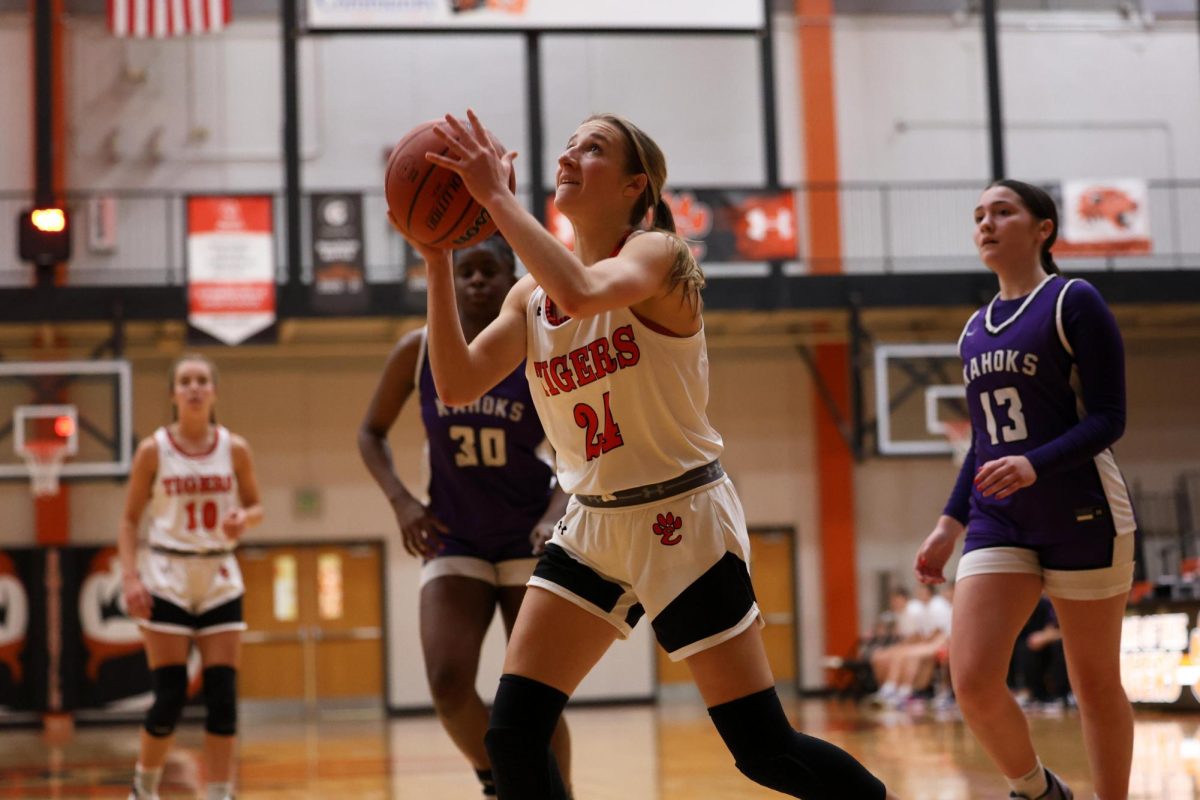 Sophie Shapiro shoots and scores against Collinsville High School.