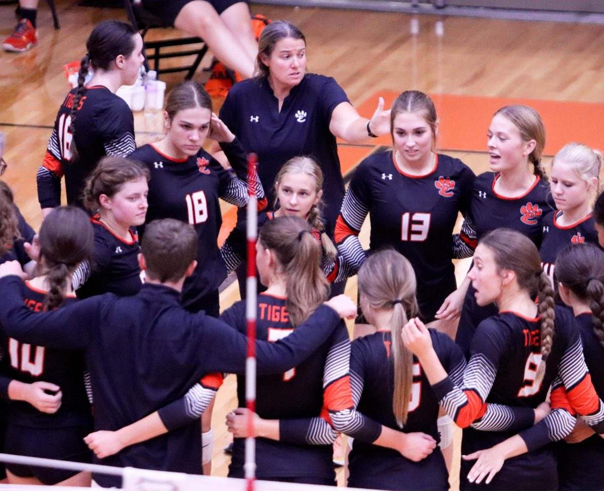 Coach Eberlin mentors the girls volleyball team.