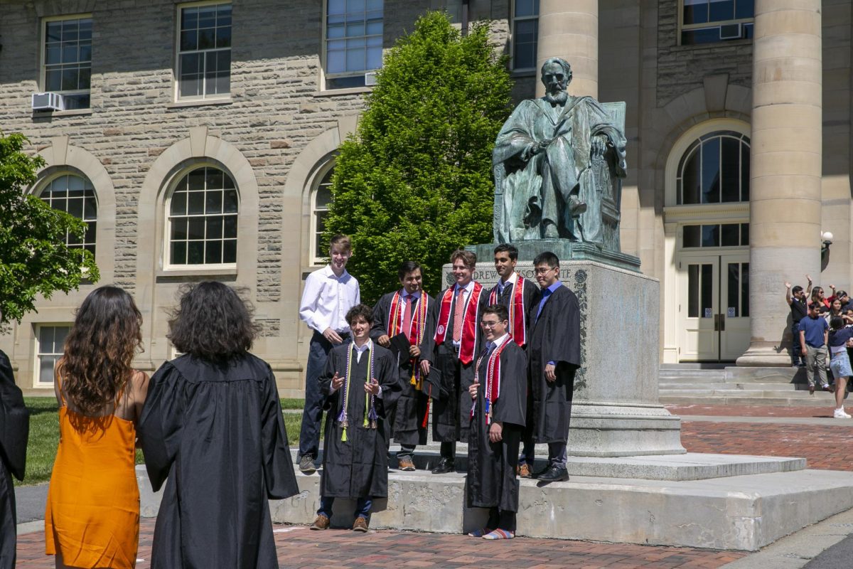 Students at Cornell University pose at their 2023 graduation.