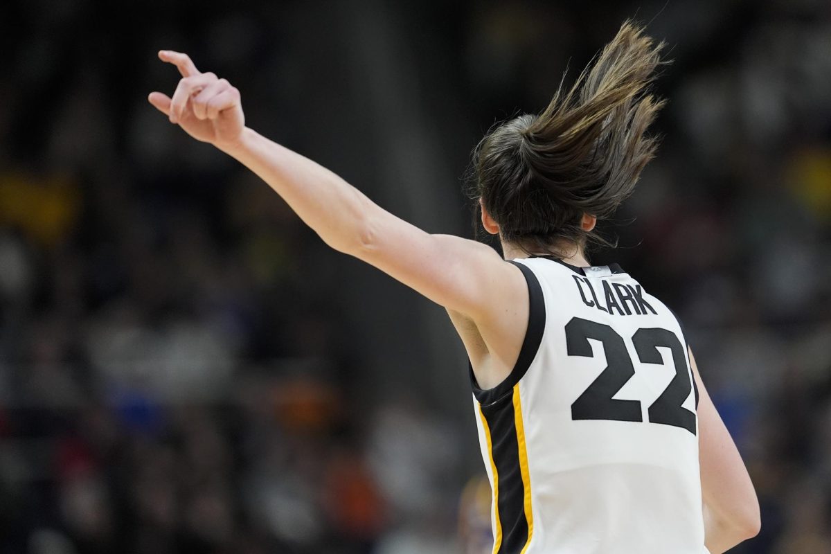 Iowa guard Caitlin Clark, No. 22, reacts during the fourth quarter of an Elite Eight game against LSU during the NCAA Women's Tournament, April 1, 2024.