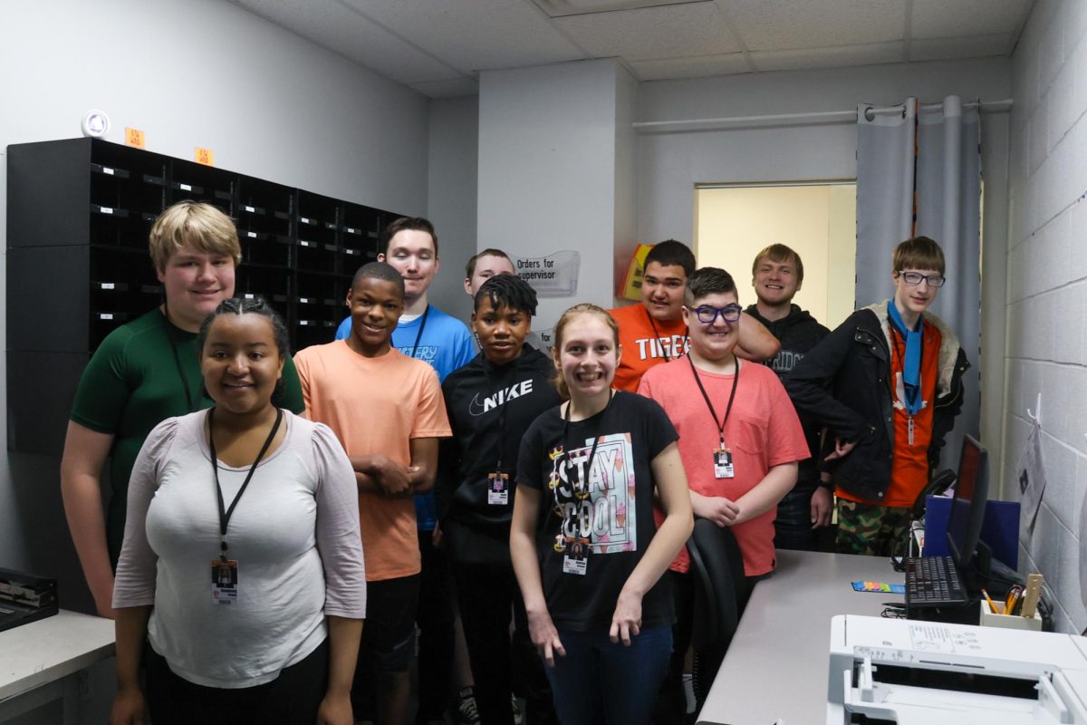 CASTLE students pose in the print shop